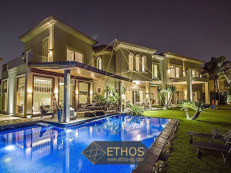 luxury villa with nice interior and exterior design for sale at swan lake new cairo